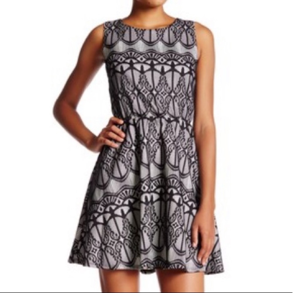 Want & Need- Woman’s Laced Fused Skater Dress